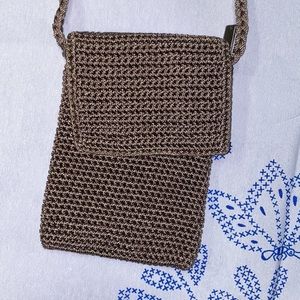 The Sak small crossbody crochet bag tan